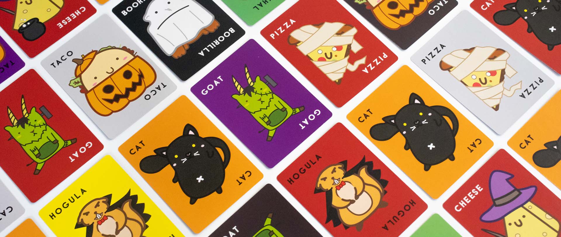Close-up of Halloween edition cards showing costumed characters