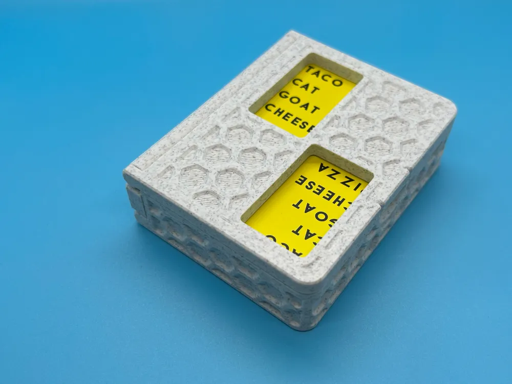 One-piece 3D printed travel case for Taco Cat Goat Cheese Pizza card game — compact and portable design
